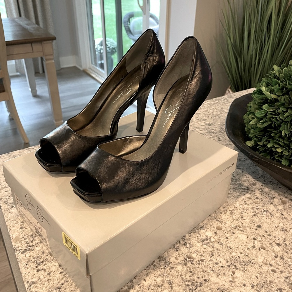 Jessica Simpson black leather peep toe heels. Size 8.5
